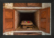 At the open grave Framed Wall